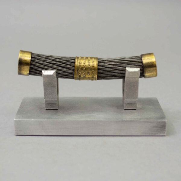 Section of Atlantic Cable with Tiffany band on metal stand