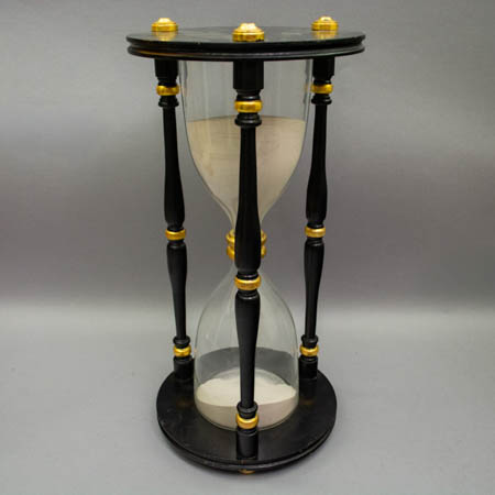 Ebonized and gilt hourglass